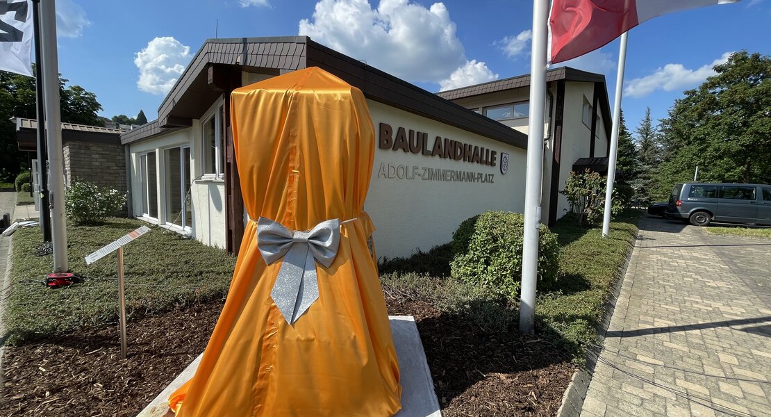 Veiled sculpture in honor of Adolf Zimmermann